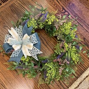 Greenery Wreath with Purple Floral Accents and Layered Bow